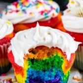 rainbow cupcake with bite missing