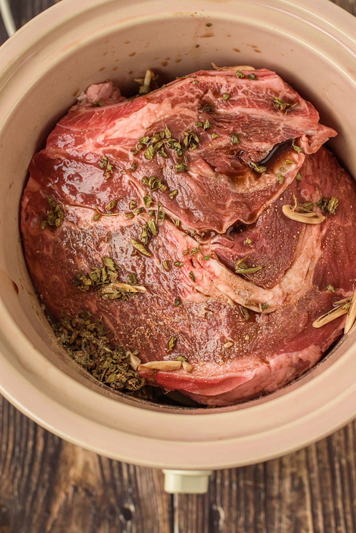 chuck roast in crockpot with herbs