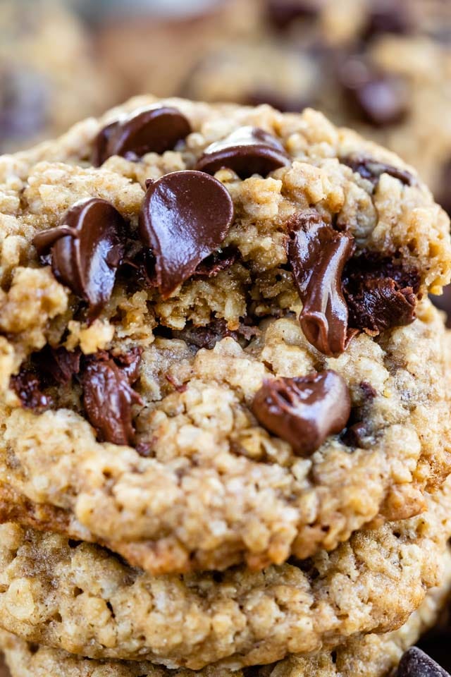 stack of chocolate chip oatmeal cookies with bite missing