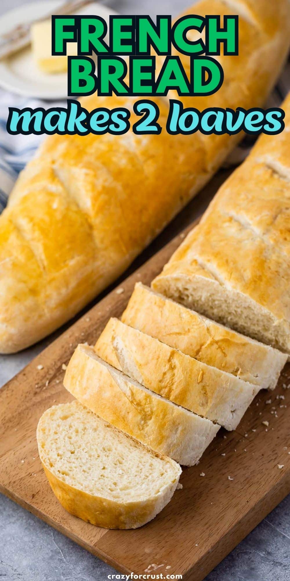 sliced loaf of french bread with loaf behind and words on photo