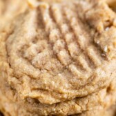 stack of 3 ingredient peanut butter cookies with words on photo