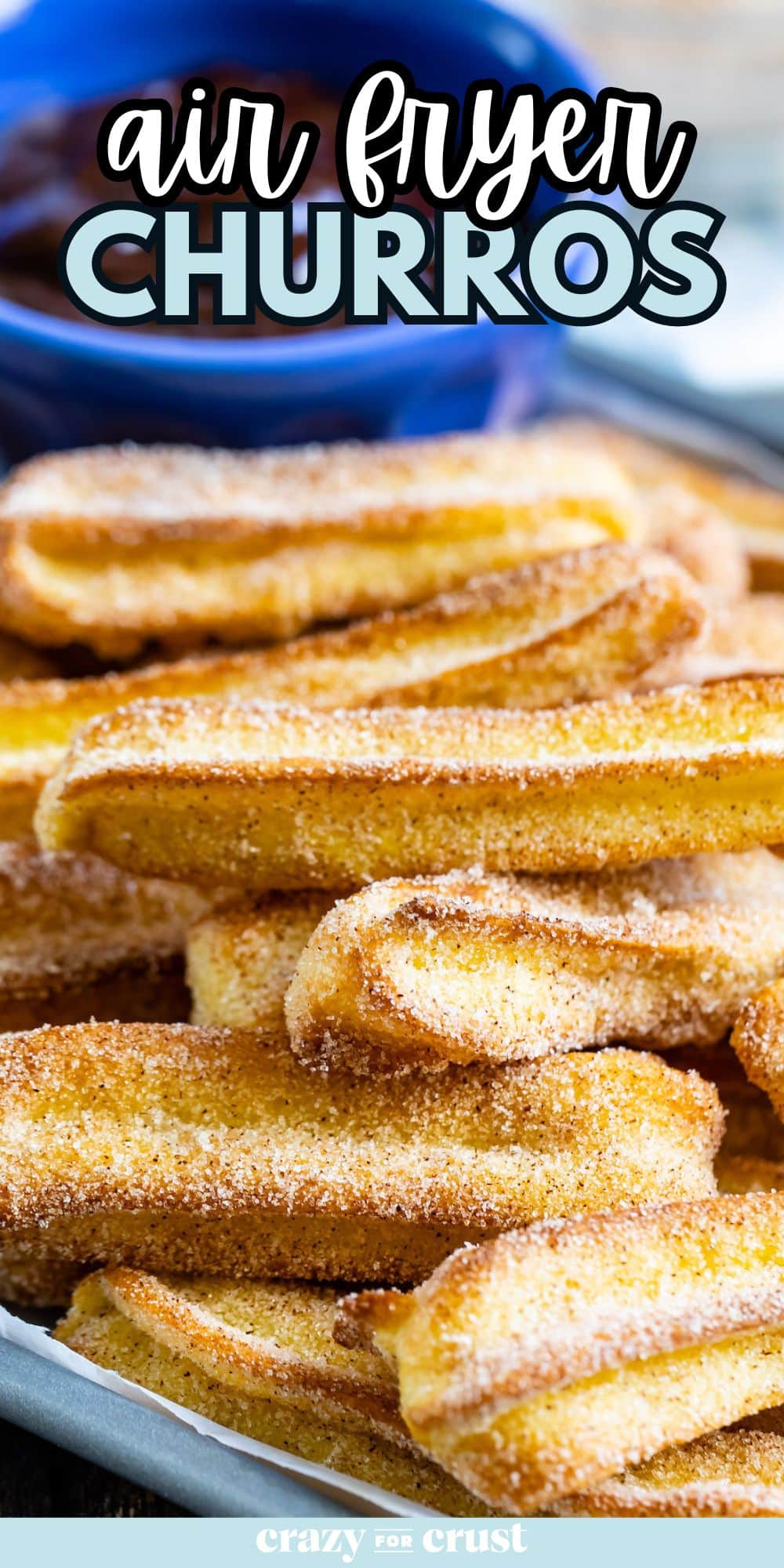 stack of churros on tray.