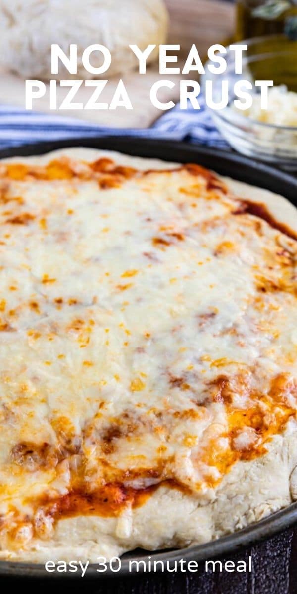 Quick pizza crust with cheese on pan