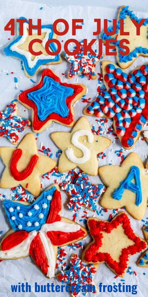 overhead shot of star shaped sugar cookies decorated with red, white and blue frosting