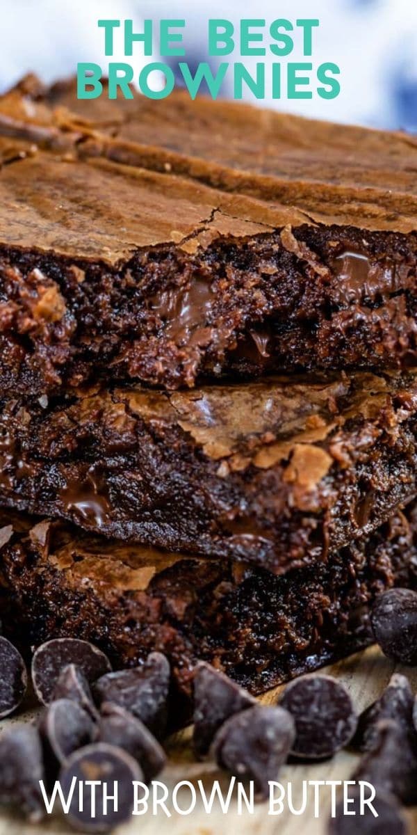 Stack of three brownies with text on top of photo and chocolate chips on bottom