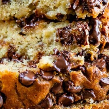 close up of stack of chocolate chip banana bread with words