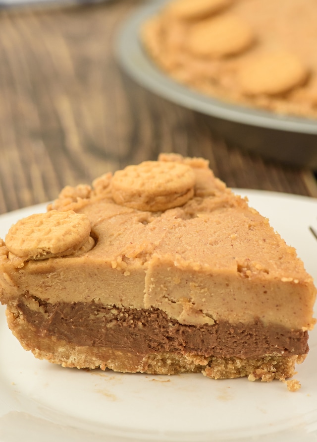 Slice of nutella peanut butter pie on a white plate