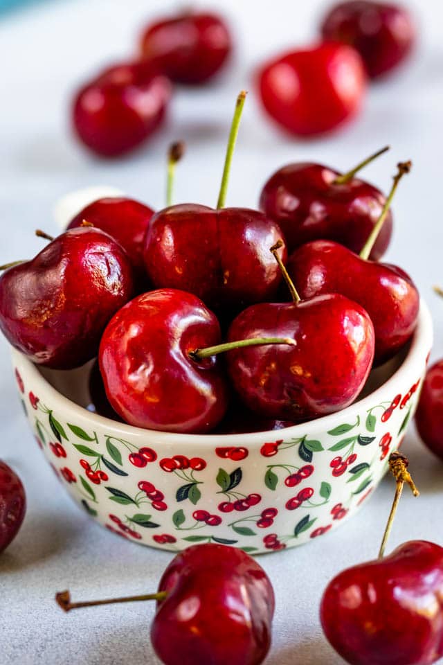 Bowl of cherries in a cherry decorated bowl