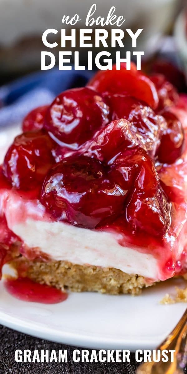 Slice of cherry delight on white plate with recipe title on top of image