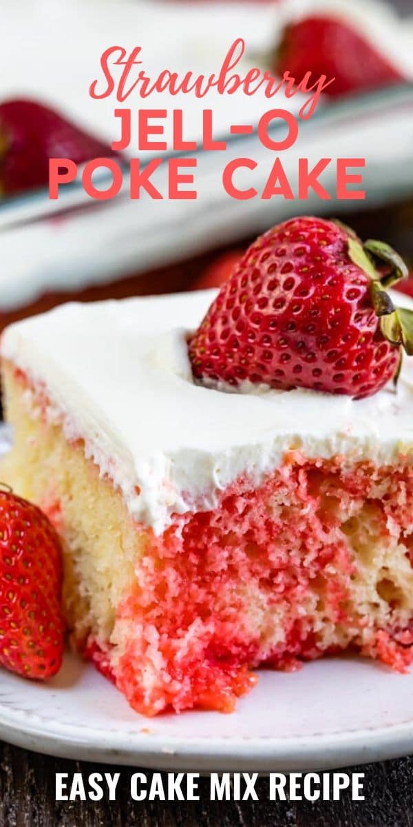 Strawberry jello poke cake on white plate with strawberry on top and one corner missing and recipe title on top of image