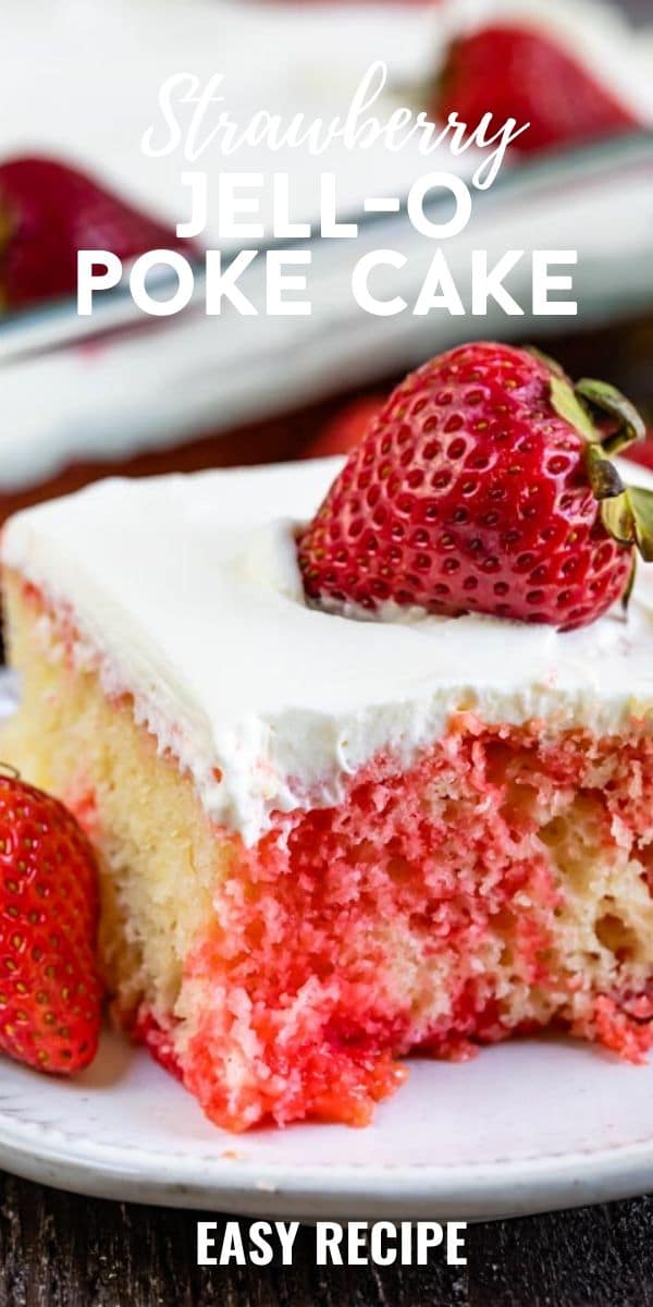 Strawberry jello poke cake slice on white plate with strawberry on top and recipe title on top of image