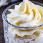 Close up shot of vanilla buttercream in a glass dish