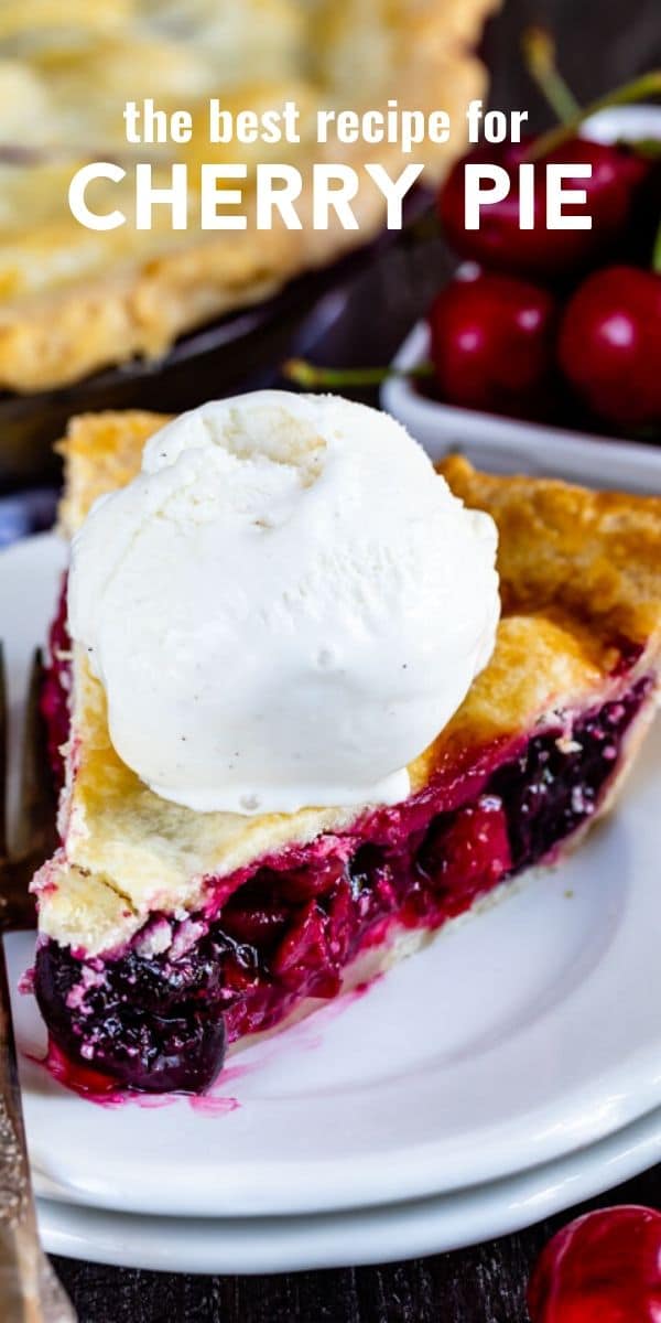 Slice of cherry pie with a scoop of ice cream on a white plate with recipe title on top of photo