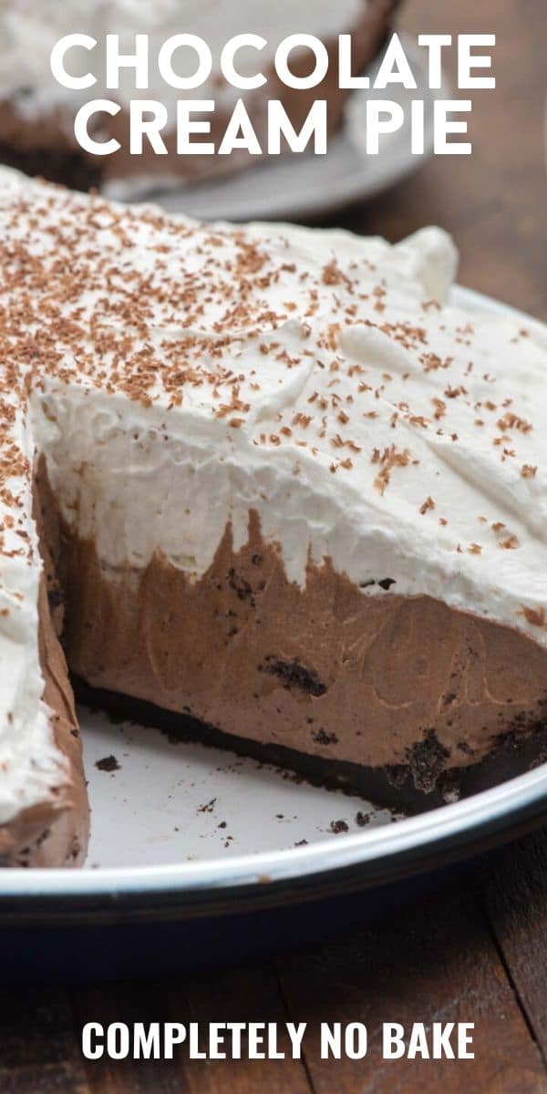 close up of chocolate cream pie with slice missing