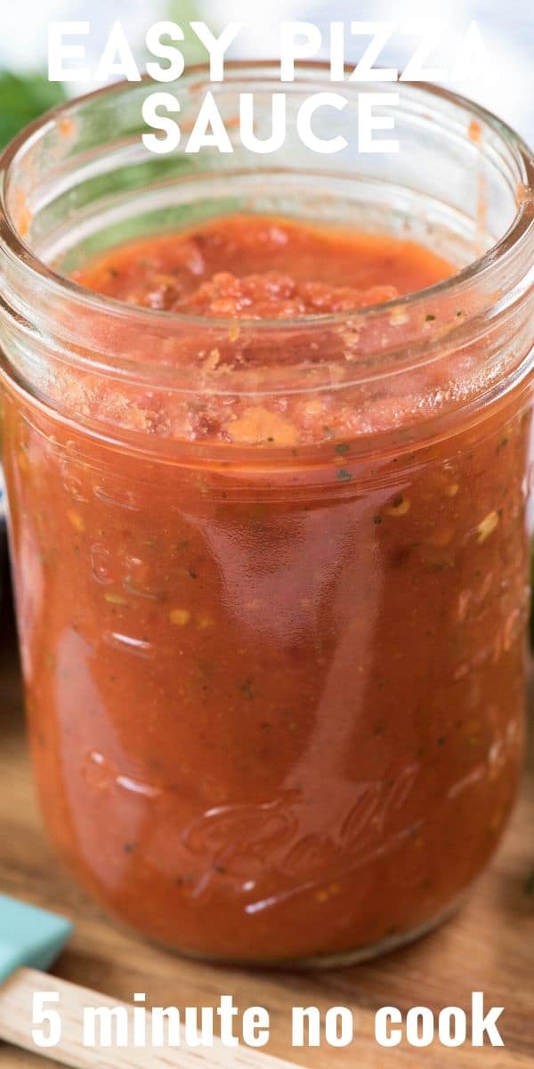 Pizza sauce in a mason jar glass on a cutting board