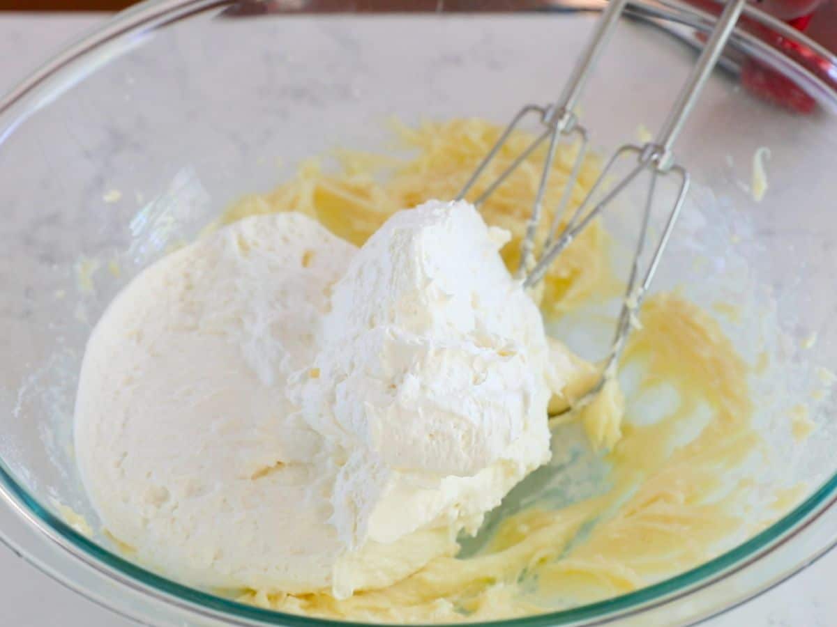 bowl with cheesecake mixture and cool whip.