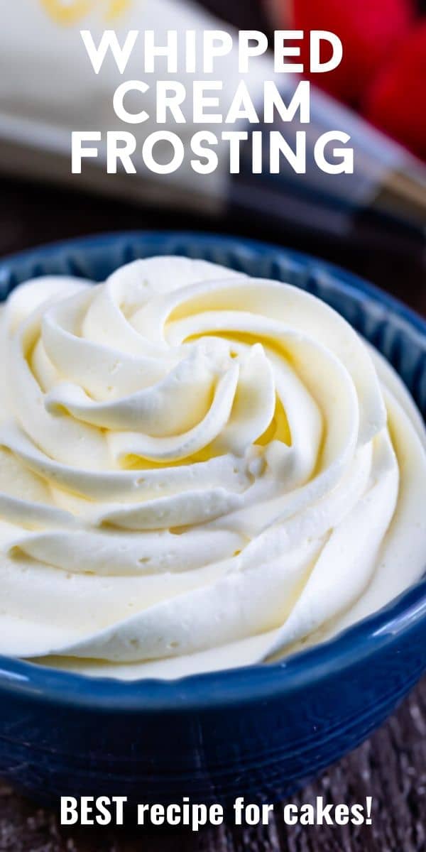 Whipped cream frosting in a blue bowl with recipe title on top