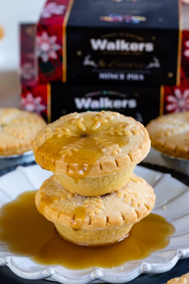 stack of Walkers mince pies with caramel sauce