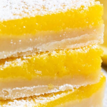 stack of lemon bars with words on photo