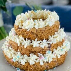 3 tiers of chocolate chip cookie cakes with vanilla frosting