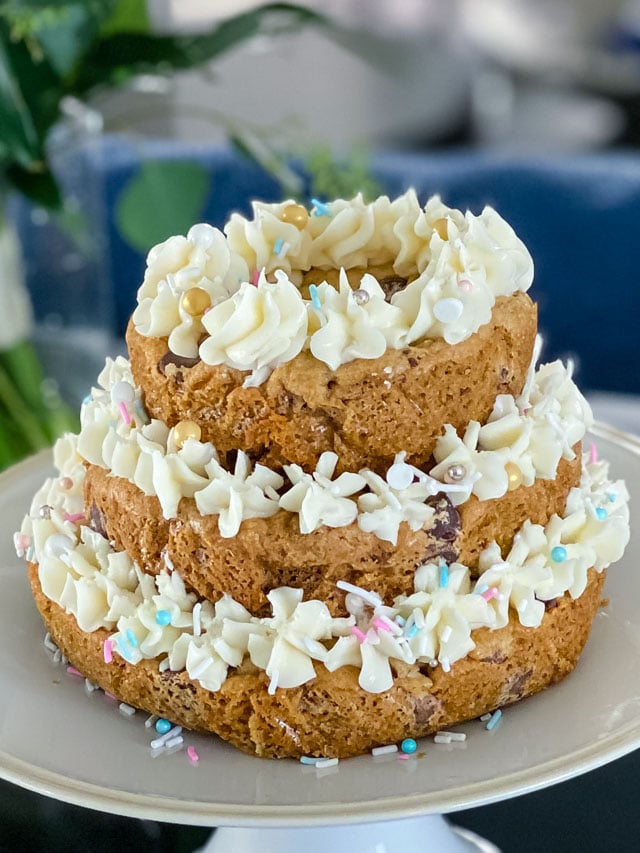 3 tiers of chocolate chip cookie cakes with vanilla frosting