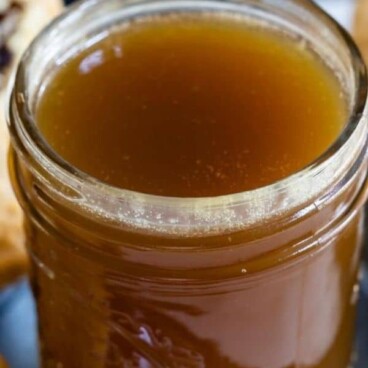 jar of caramel sauce with words on photo