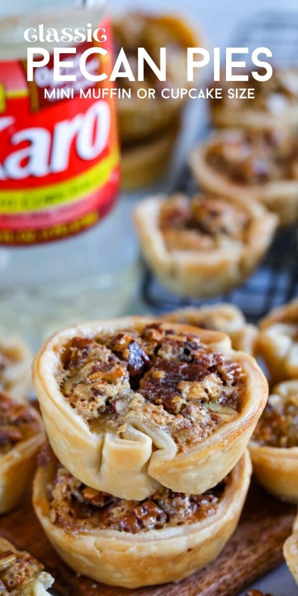 Mini pecan pies stacked on top of eachother with karo syrup in background