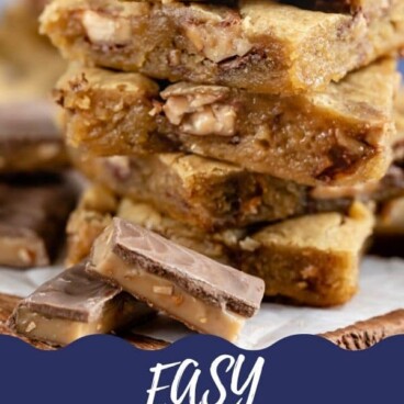 Close up of the side of the stack of toffee blondies with color block and recipe title on bottom of photo