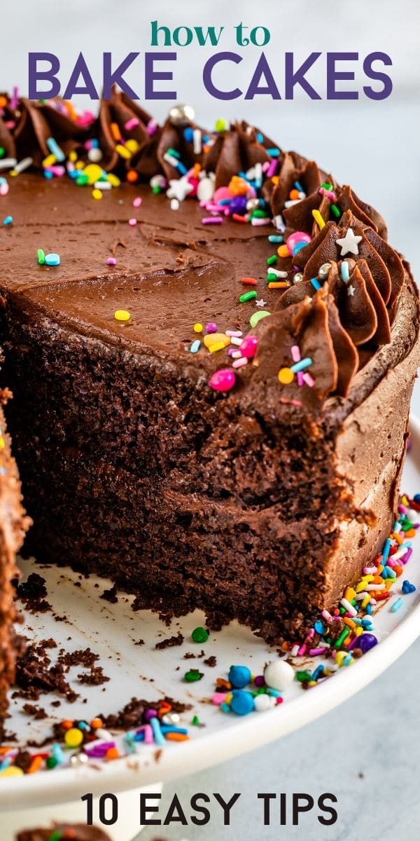 chocolate cake with slice missing and words on photo