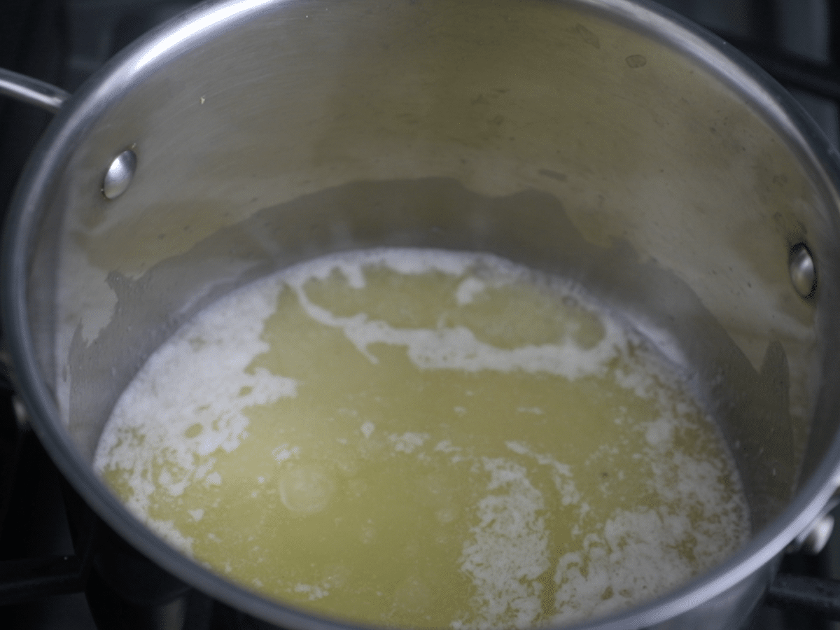 pan with melted butter.