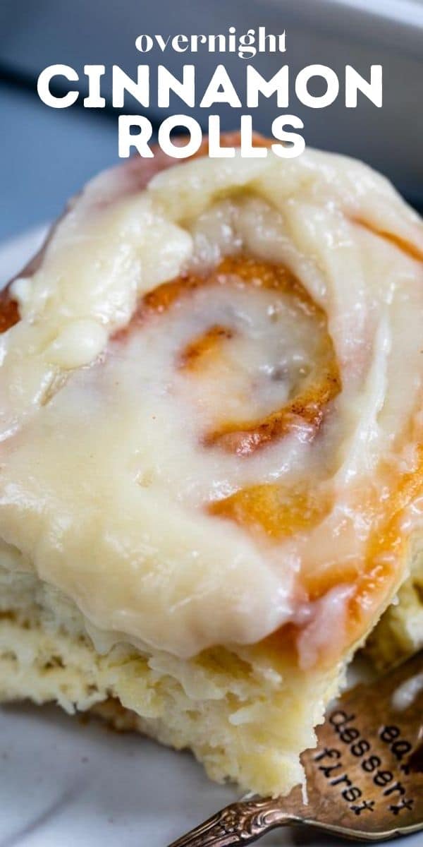 cinnamon roll on plate with words on photo