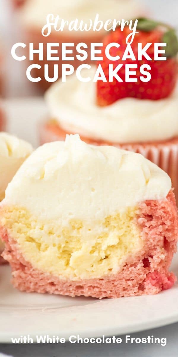 Close up of strawberry cheesecake cupcake cut in half to show filling with recipe title on top