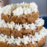 wedding cookie cake on white plate with words on photo