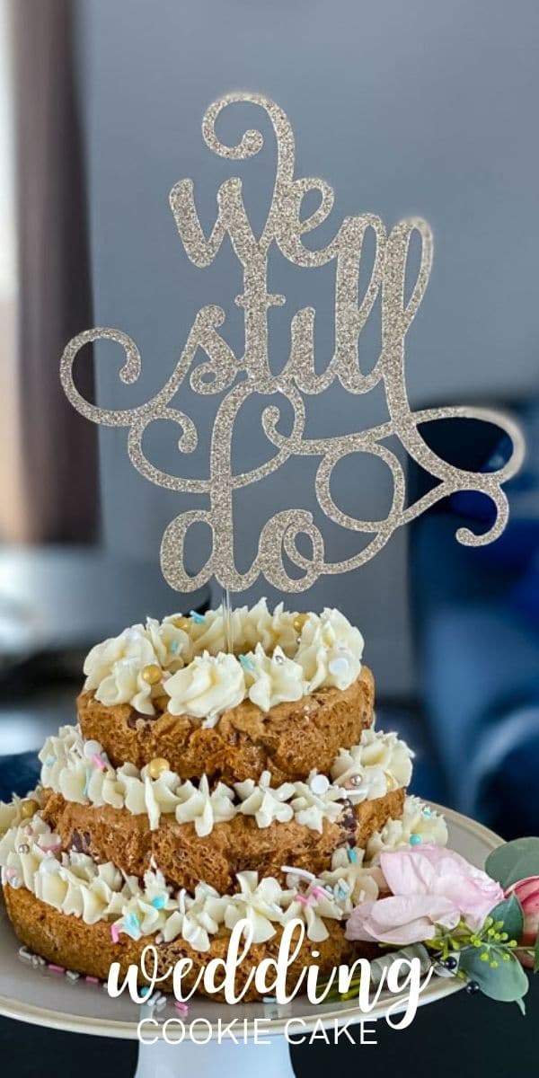 three tier cookie cake with "we still do" cake topper