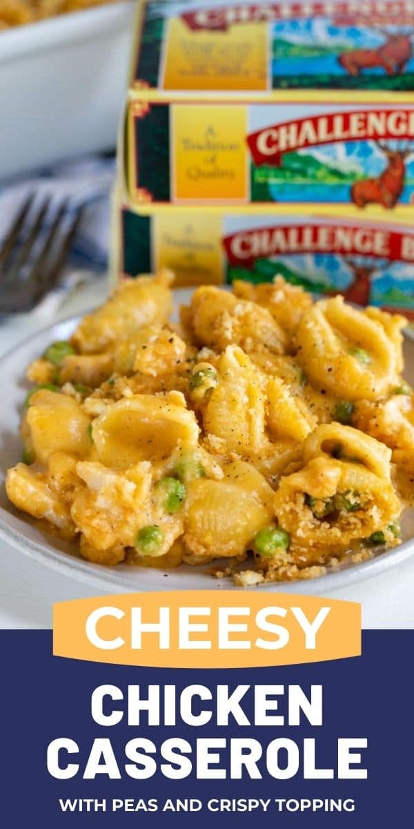 Easy cheesy chicken casserole on a grey place with challenge butter in background with recipe title on bottom of photo