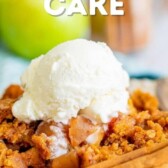Apple dump cake on a white plate with a scoop of ice cream on top and recipe title on top of image