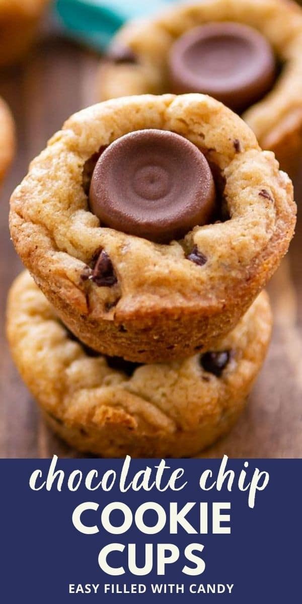Close up of chocolate chip cookie cups stacked on top of eachother on a wood cutting board with recipe title on bottom