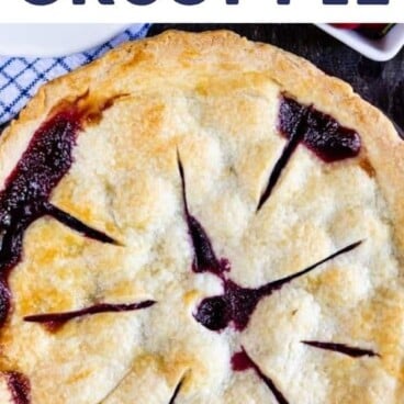 Overhead shot of baked double crust pie with recipe title on top