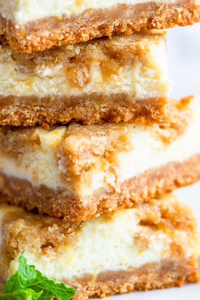 Close up of lemon cheesecake bars with nilla wafer crust