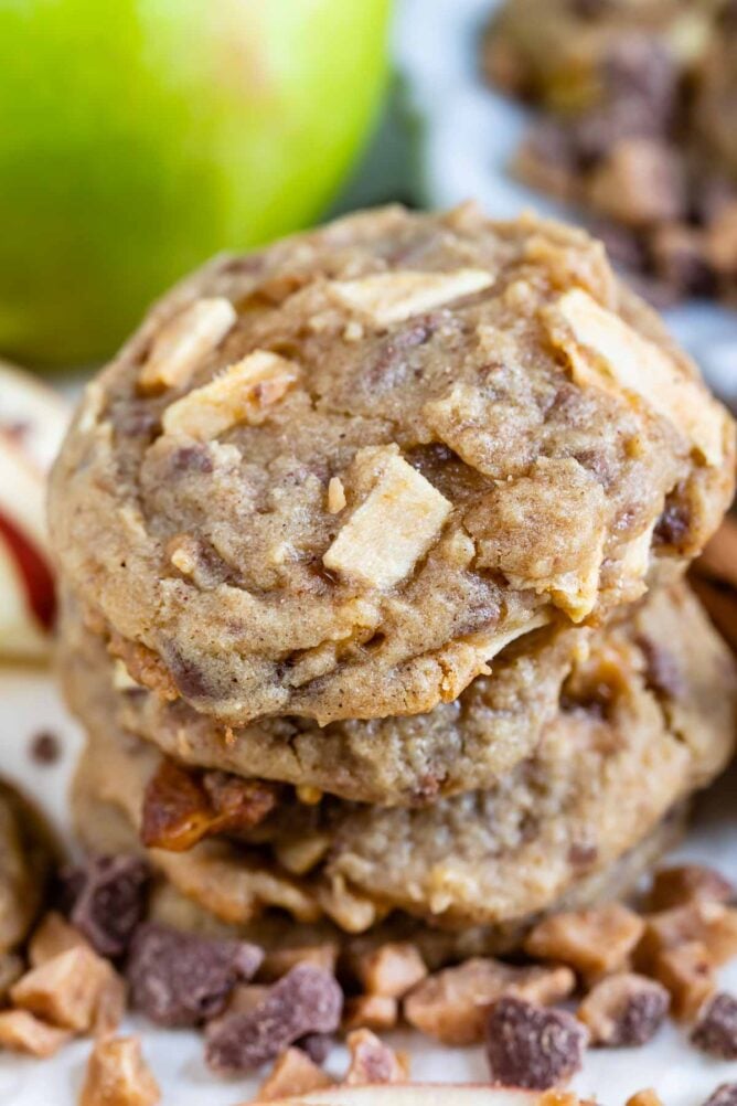 Stack of apple cookies with toffee bits all around them