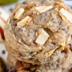 Close up photo of stack of apple cookies with toffee bits all around