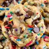 Stack of birthday cookies on a white plate with recipe title on image