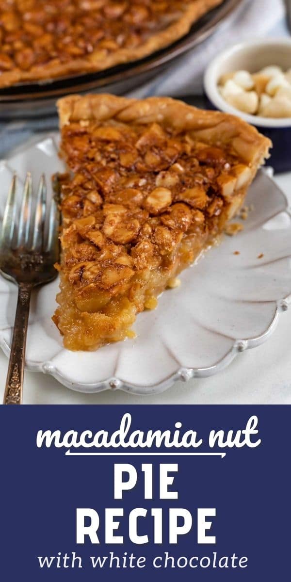Slice of macadamia nut pie on a white scalloped plate with silver fork and recipe title on bottom of image