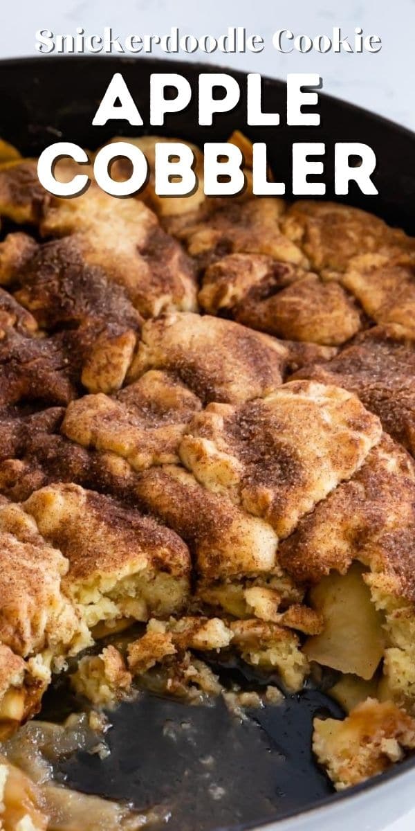 Snickerdoodle apple cobbler in iron skillet pan with a corner missing