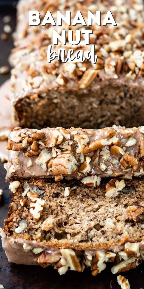 loaf of banana bread with glaze and pecans sliced on cookie sheet