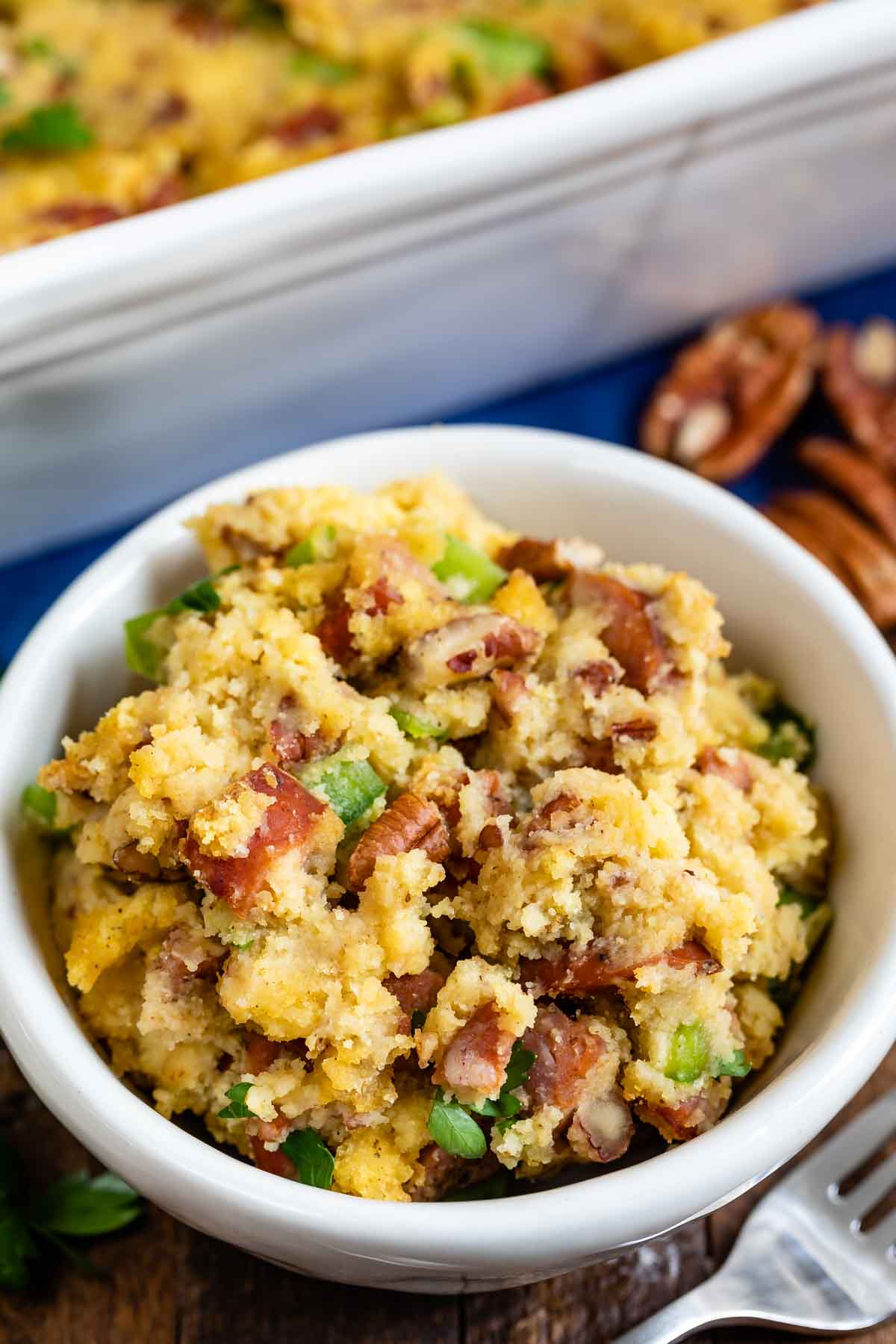 Cornbread stuffing in a white ramekin ready for serving