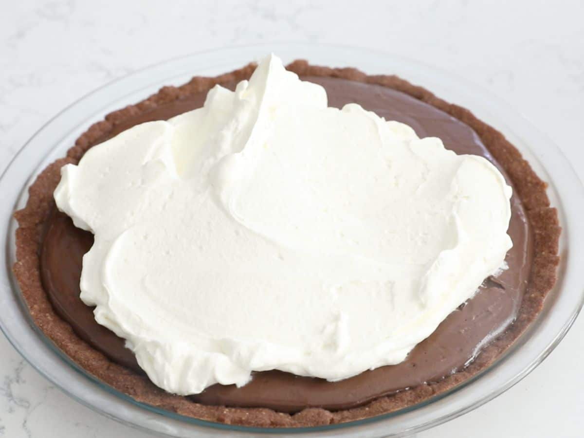 whipped cream on top of pie.