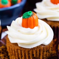 Close up of pumpkin cupcake with pumpkin candy on top