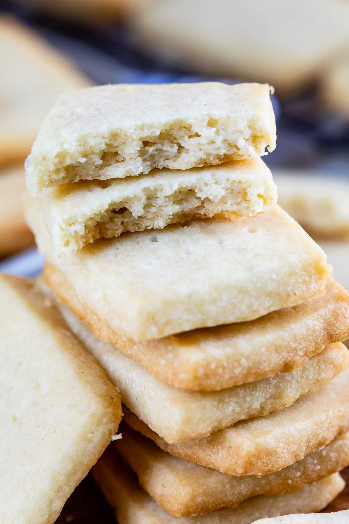 stack of 3 shortbread cookie rectangles with two halves on top