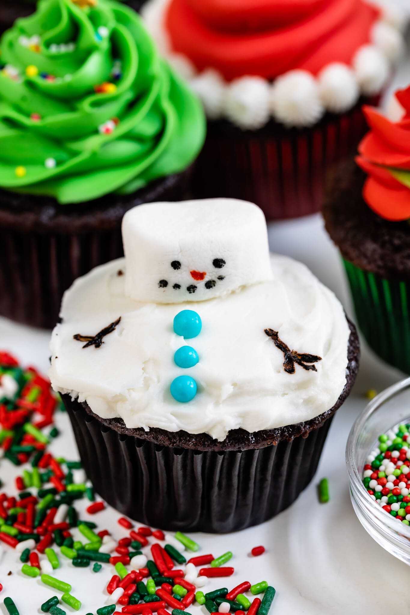cupcake decorated like a melting snowman